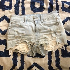 Distressed light wash jean shorts